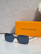 Louis Vuitton square sunglasses, blue tinted lenses, gold chain-link temples