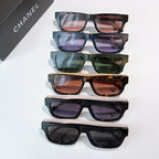 Assorted square sunglasses set with tinted lenses and Chanel logos on temples