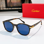 Cartier sunglasses with blue lenses and tortoiseshell frames