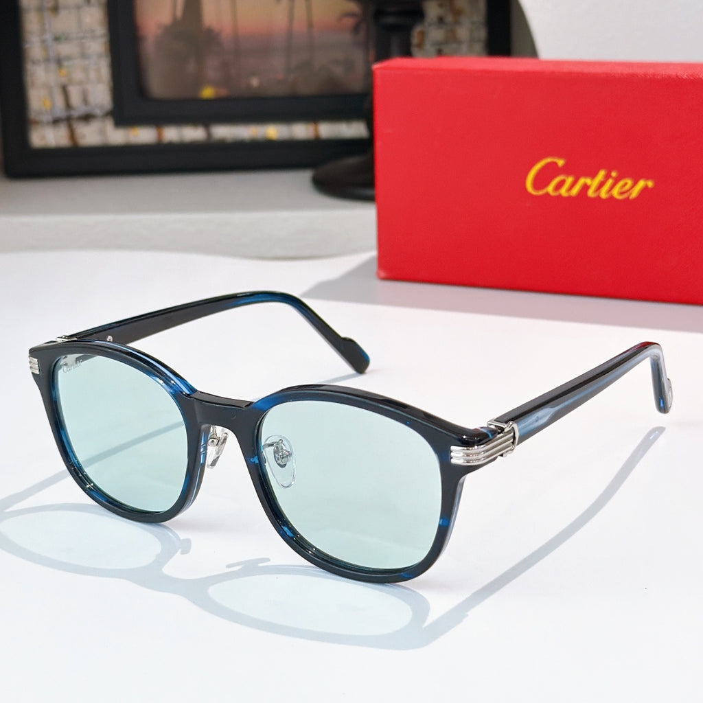 Cartier sunglasses with dark blue lenses and black frames