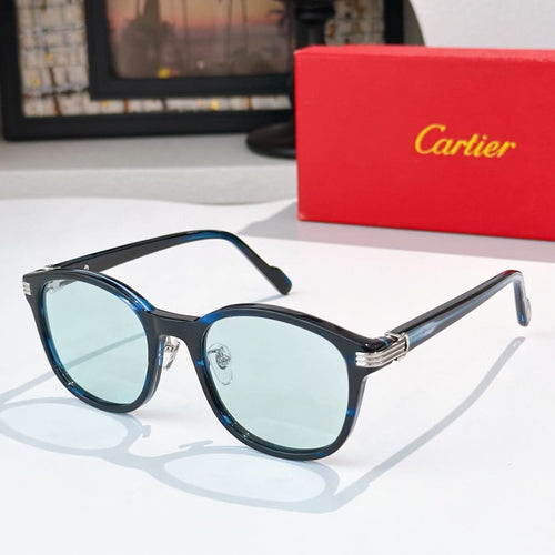 Cartier sunglasses with dark blue lenses and black frames