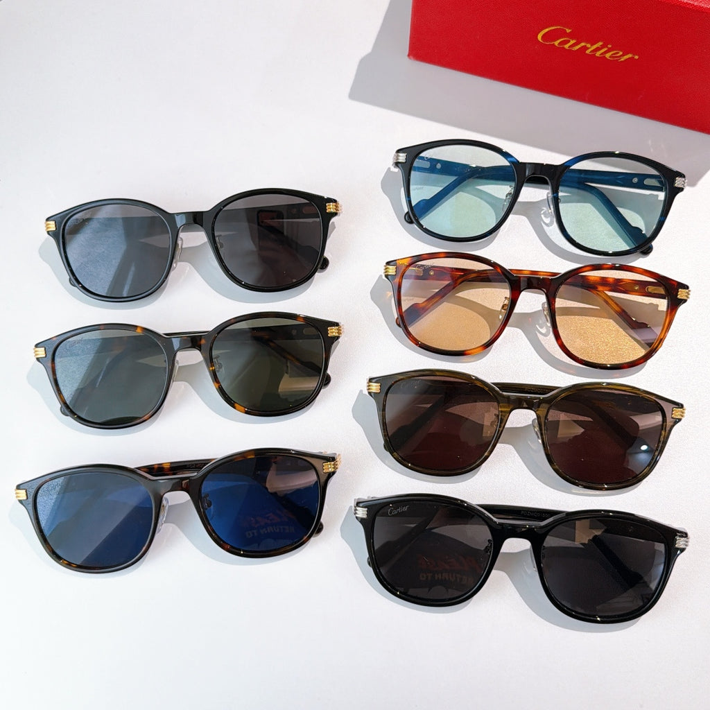 Set of Cartier sunglasses showing multiple frames and colored lenses