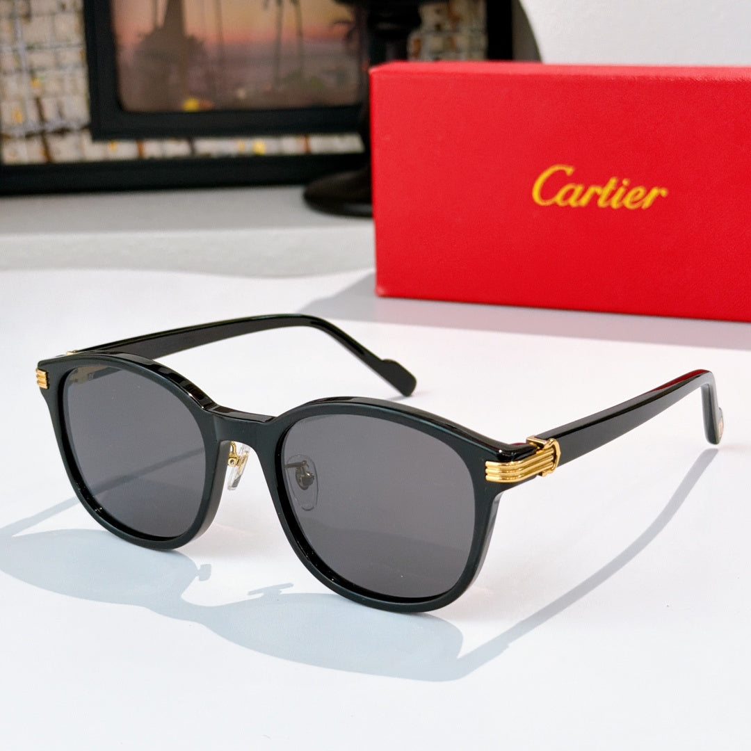 Cartier sunglasses with gray lenses and black frames