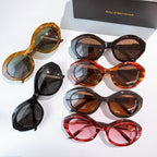 Assorted set of six cat-eye sunglasses with tinted lenses and mixed frame colors