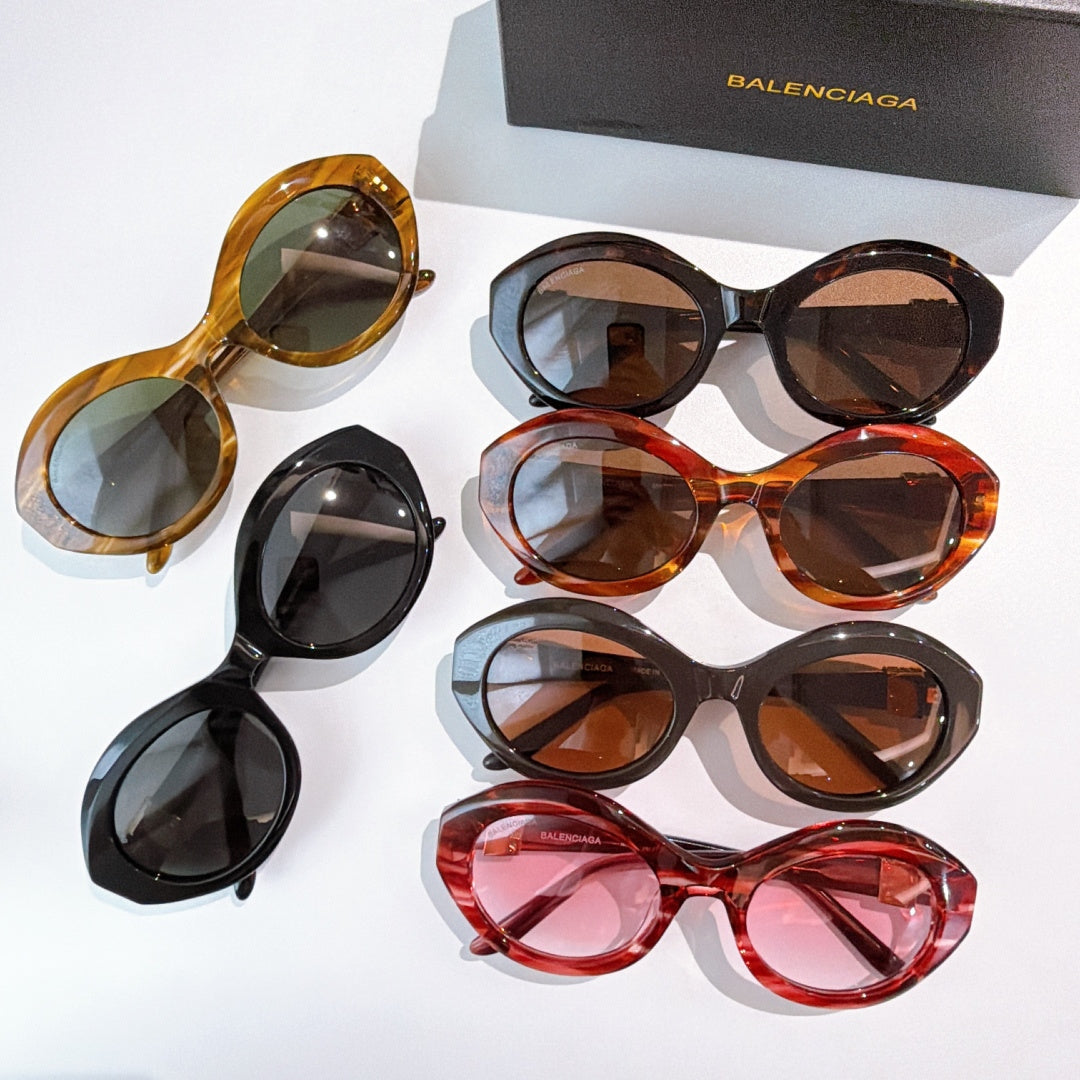 Assorted set of six cat-eye sunglasses with tinted lenses and mixed frame colors