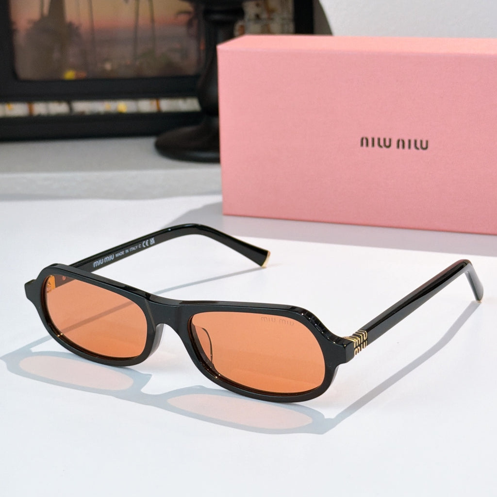 Sunglasses with black frame and orange tinted lenses, rounded cat-eye shape