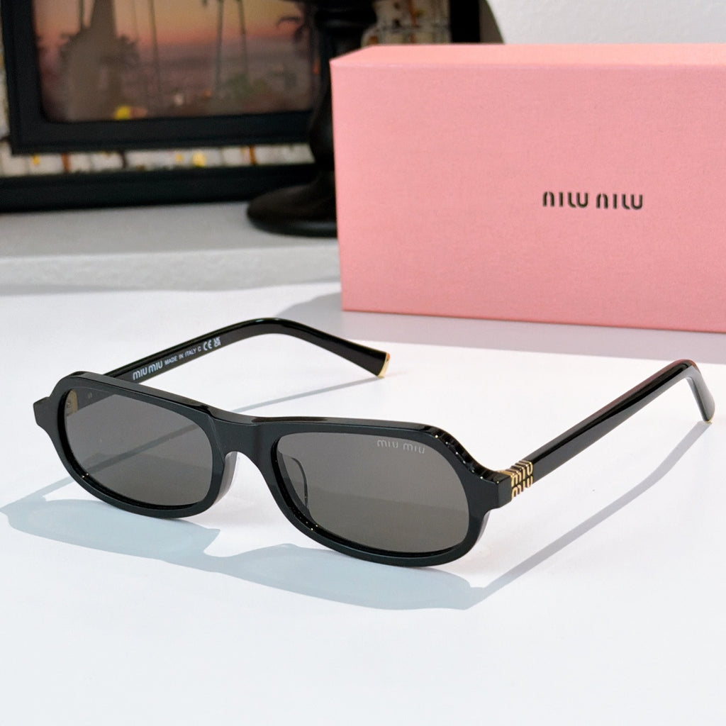 Sunglasses with black frame and dark gray tinted lenses, rounded cat-eye shape