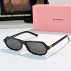 Sunglasses with black frame and dark gray tinted lenses, rounded cat-eye shape