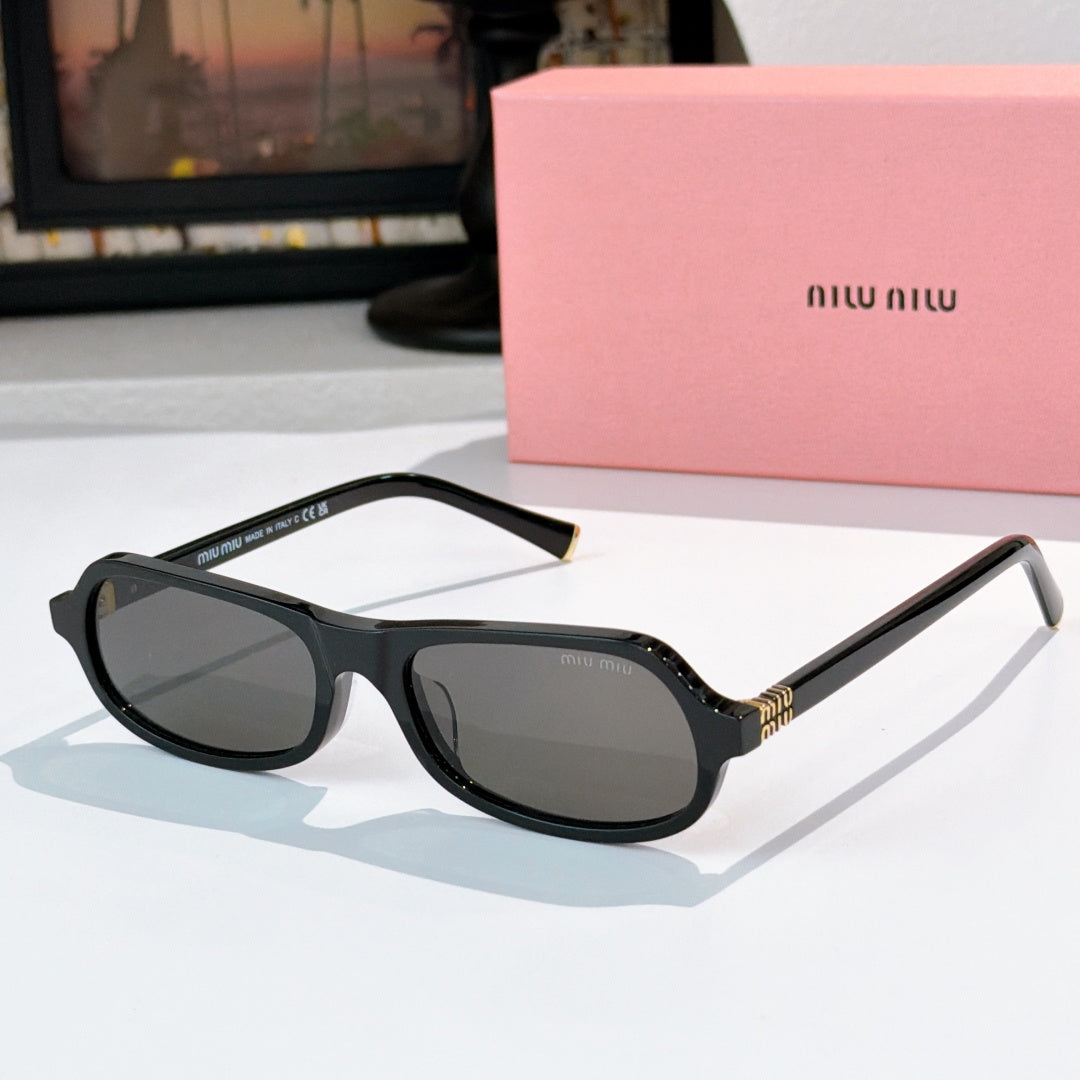 Sunglasses with black frame and dark gray tinted lenses, rounded cat-eye shape