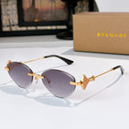 Bvlgari sunglasses with gold-tone frame and purple gradient lenses.