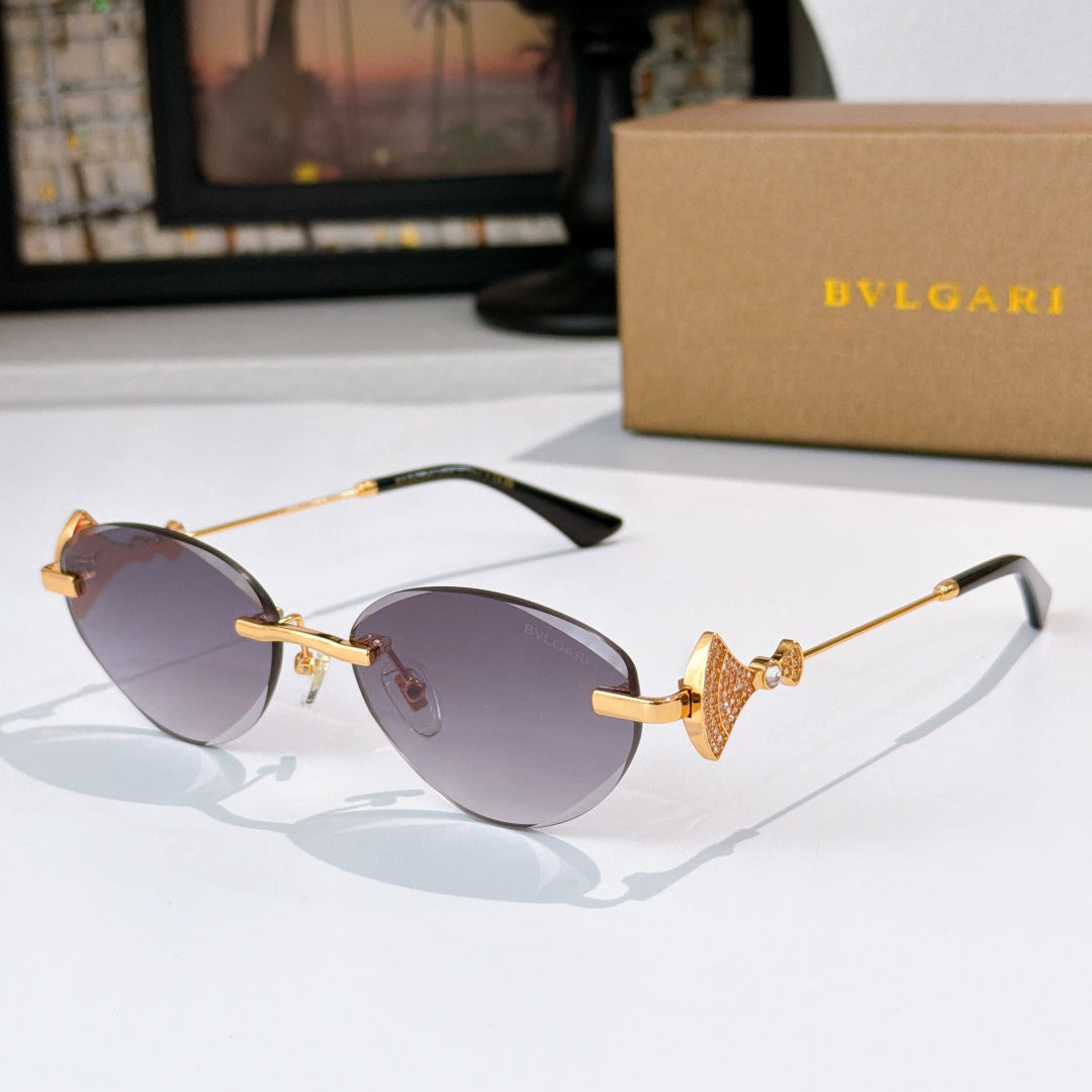 Bvlgari sunglasses with gold-tone frame and purple gradient lenses.