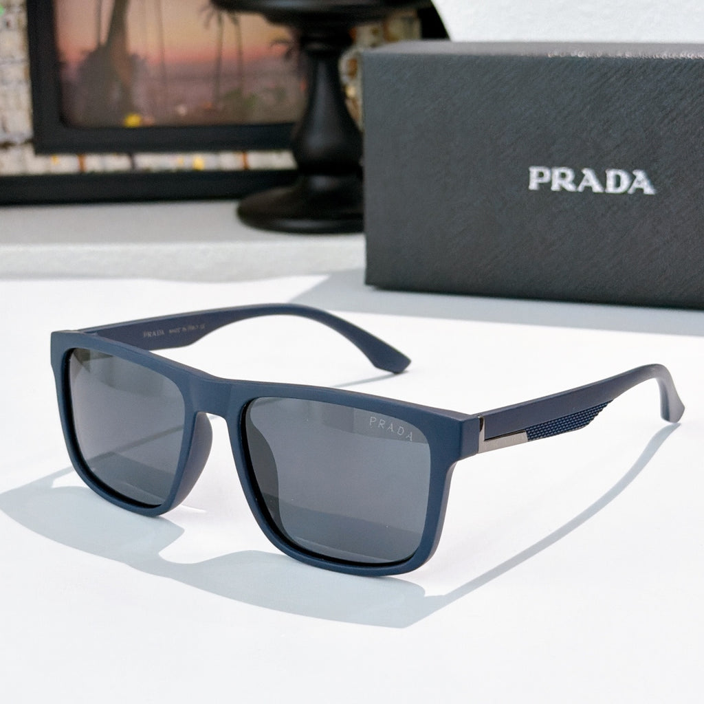 Sunglasses with blue frames and dark tinted lenses