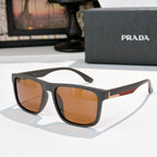 Sunglasses with dark frames and orange-tinted lenses