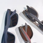 Sunglasses set with blue and gray frames and tinted lenses