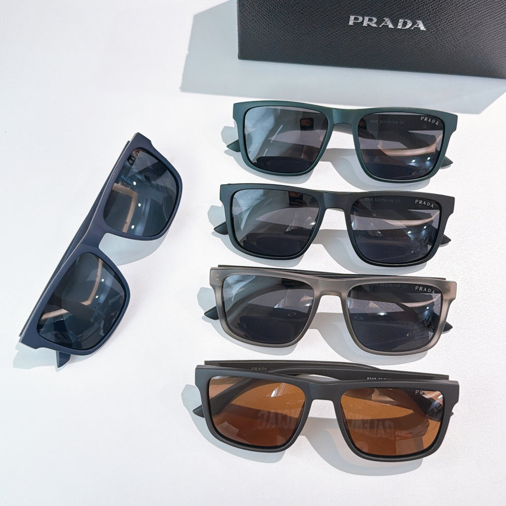 Assorted sunglasses with tinted lenses in multiple frame colors