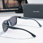 Prada sunglasses side view with gray lenses and light blue frame