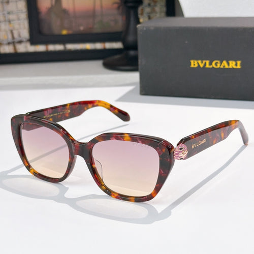Tortoise square eyeglasses with rose-tinted lenses and gold logo detail