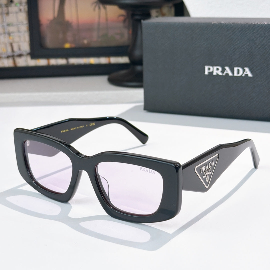 PRADA black cat-eye sunglasses with logo badge and tinted lenses