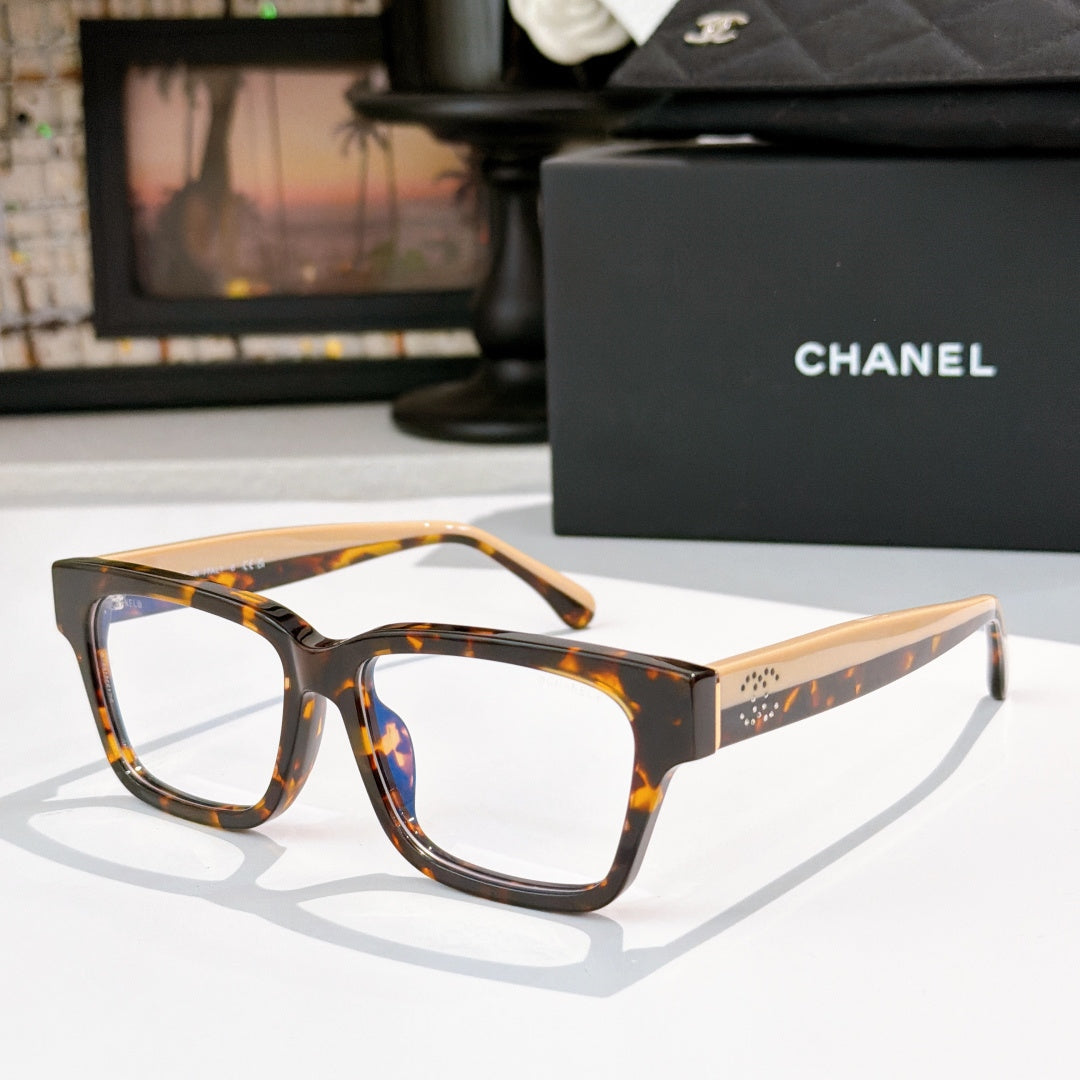Chanel eyeglasses with tortoiseshell square frames and blue-tinted lenses, front logo