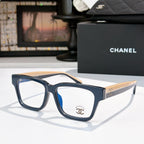 Chanel eyeglasses with dark blue square frames and tan temple accents, front logo