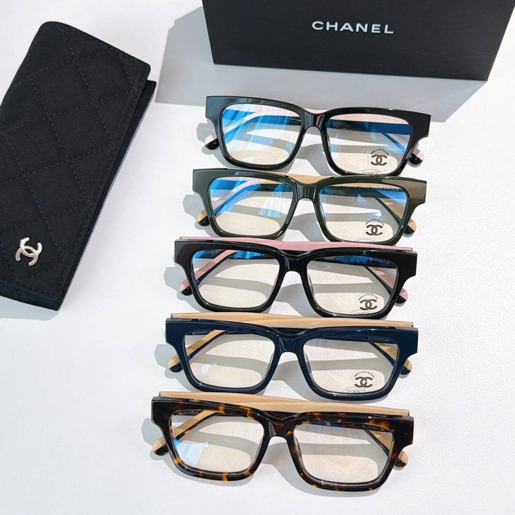 Chanel eyeglasses set with four square frames in black, green, navy, and tortoiseshell