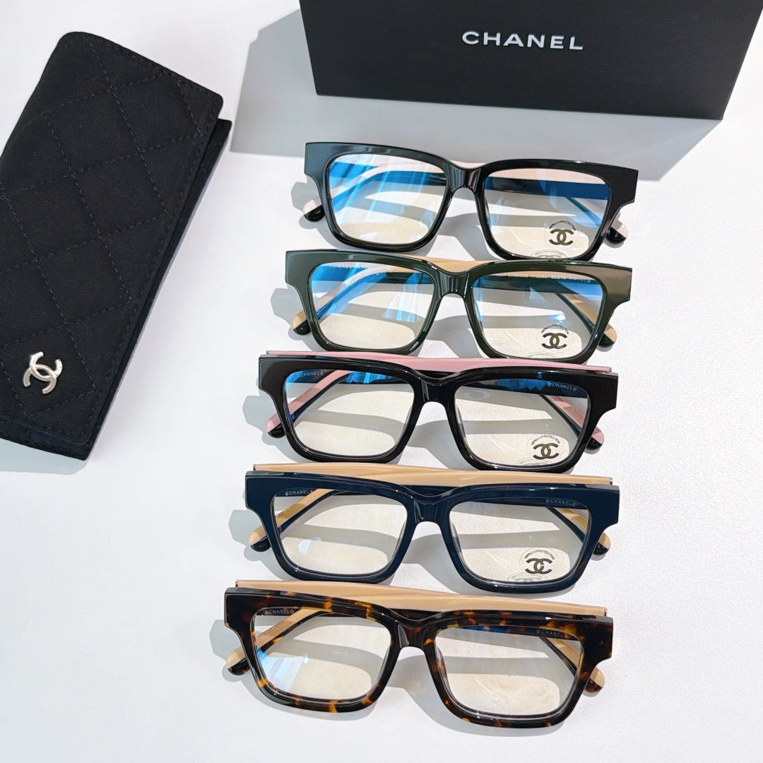 Chanel eyeglasses set with four square frames in black, green, navy, and tortoiseshell