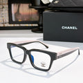 Chanel eyeglasses with black square frames and blue-tinted lenses, front logo detail