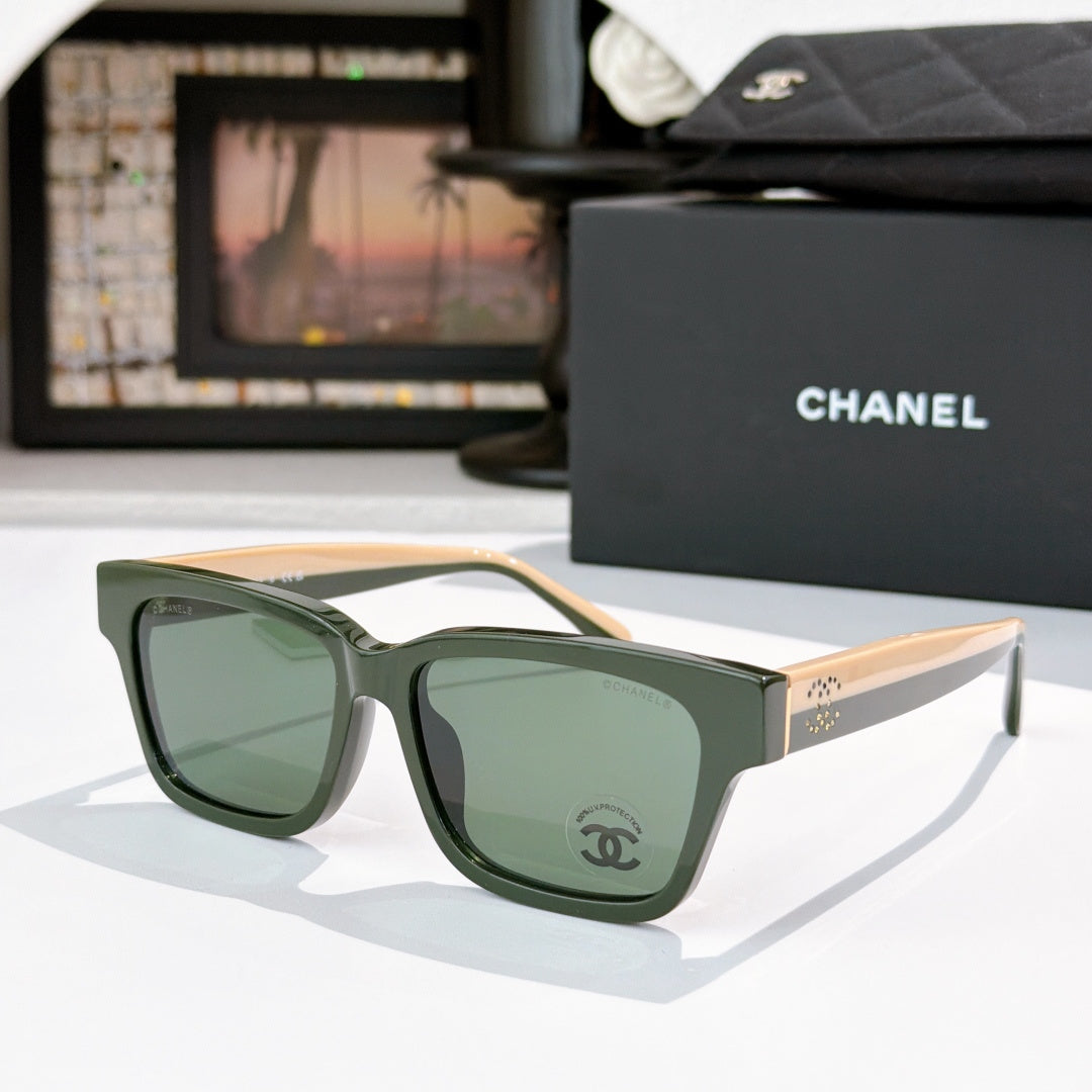 CHANEL cat-eye sunglasses, green frames, green-tinted lenses, light tan temples