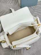 White Prada handbag interior view with zip pocket and beige lining
