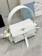 White Prada handbag with adjustable strap and gold logo emblem on front