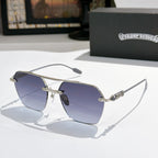 Chrome metal sunglasses with blue tinted lenses and ornate silver temple details
