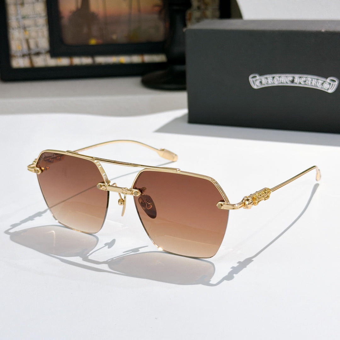 Chrome metal sunglasses with amber tinted lenses and gold-toned frame