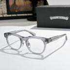 Light gray eyeglass frames with silver ornate hinges and clear lenses