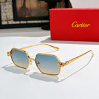 Gold-tone rectangular sunglasses with pale blue lenses and patterned temple details