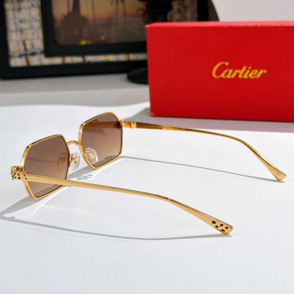 Gold-tone rectangular sunglasses with brown lenses, angled side view