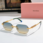 Miu Miu sunglasses with gold frame, light blue lenses, green temple accent