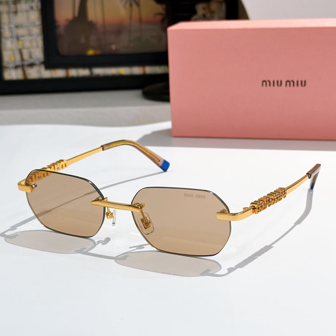 Miu Miu sunglasses with gold frame, light tan lenses, blue temple tips