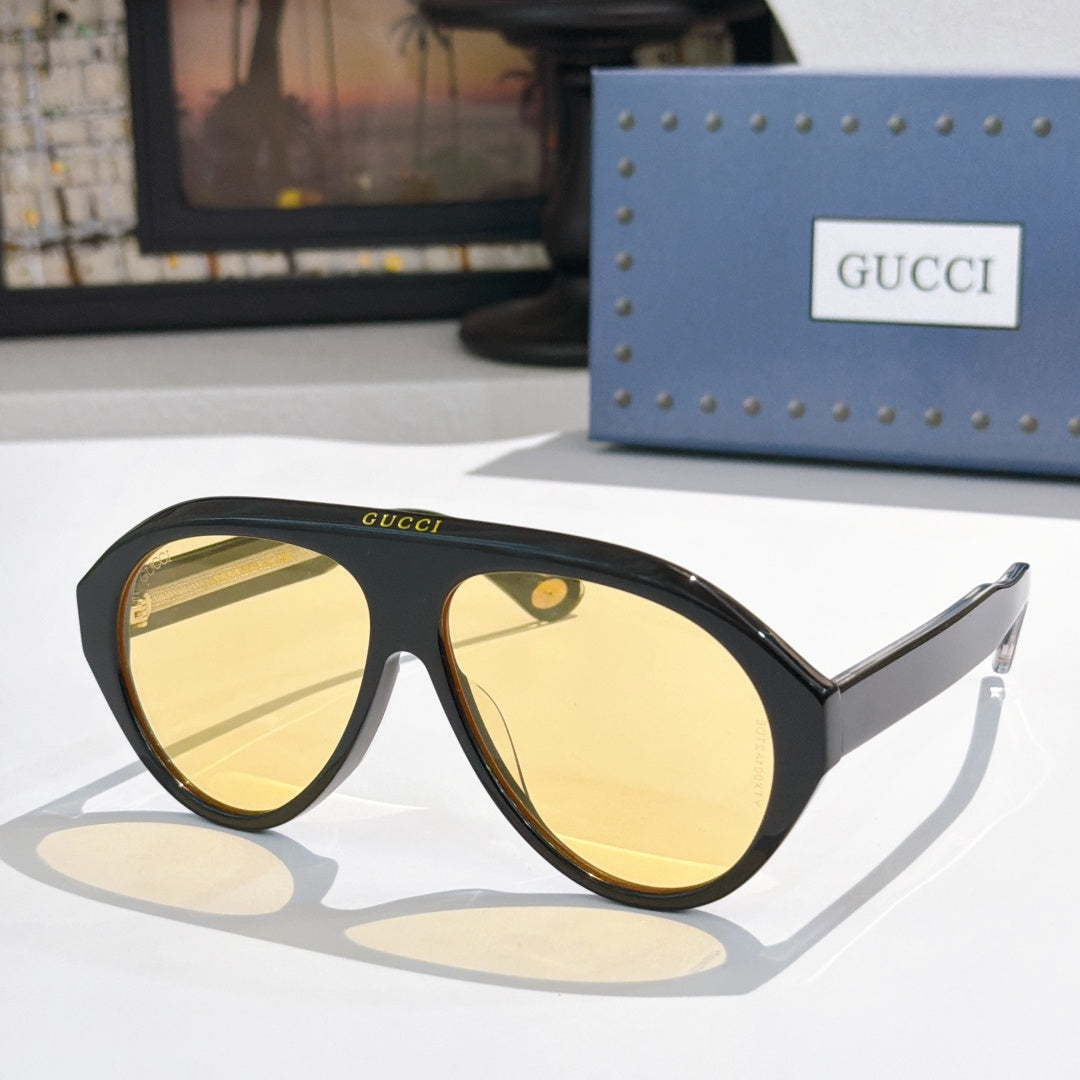 Versace sunglasses, black frames with gold yellow lenses