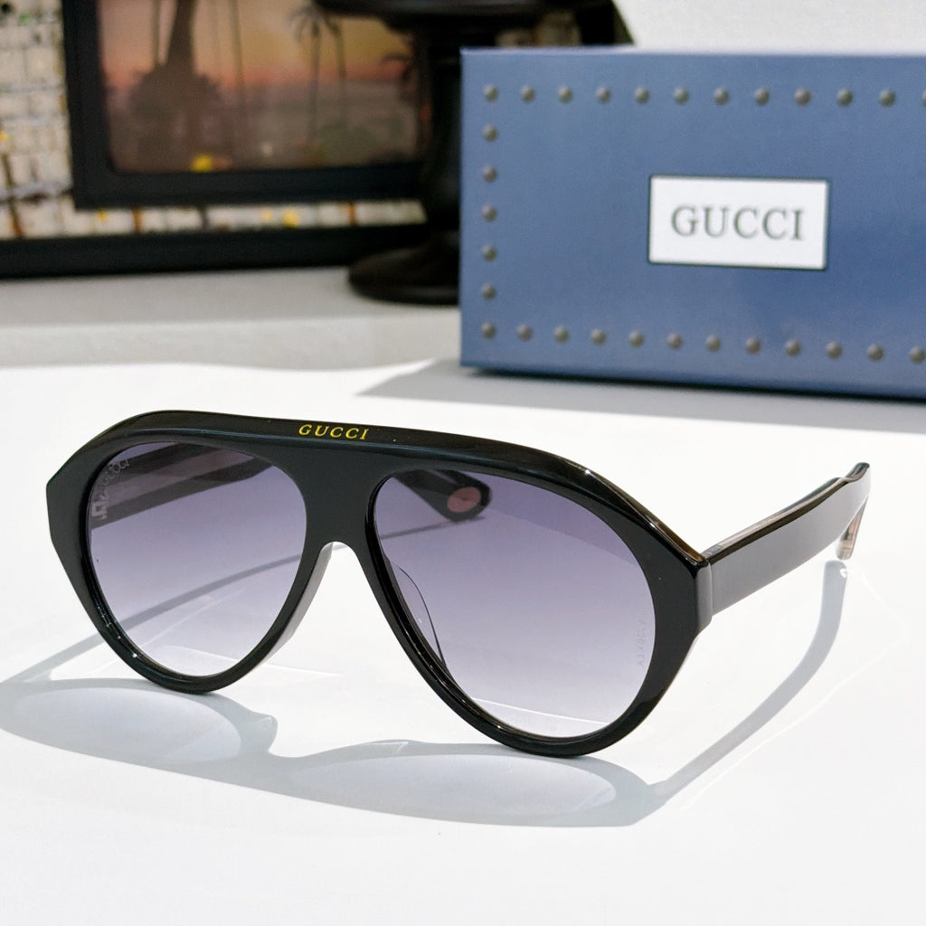 Versace sunglasses, black frames with purple tinted lenses
