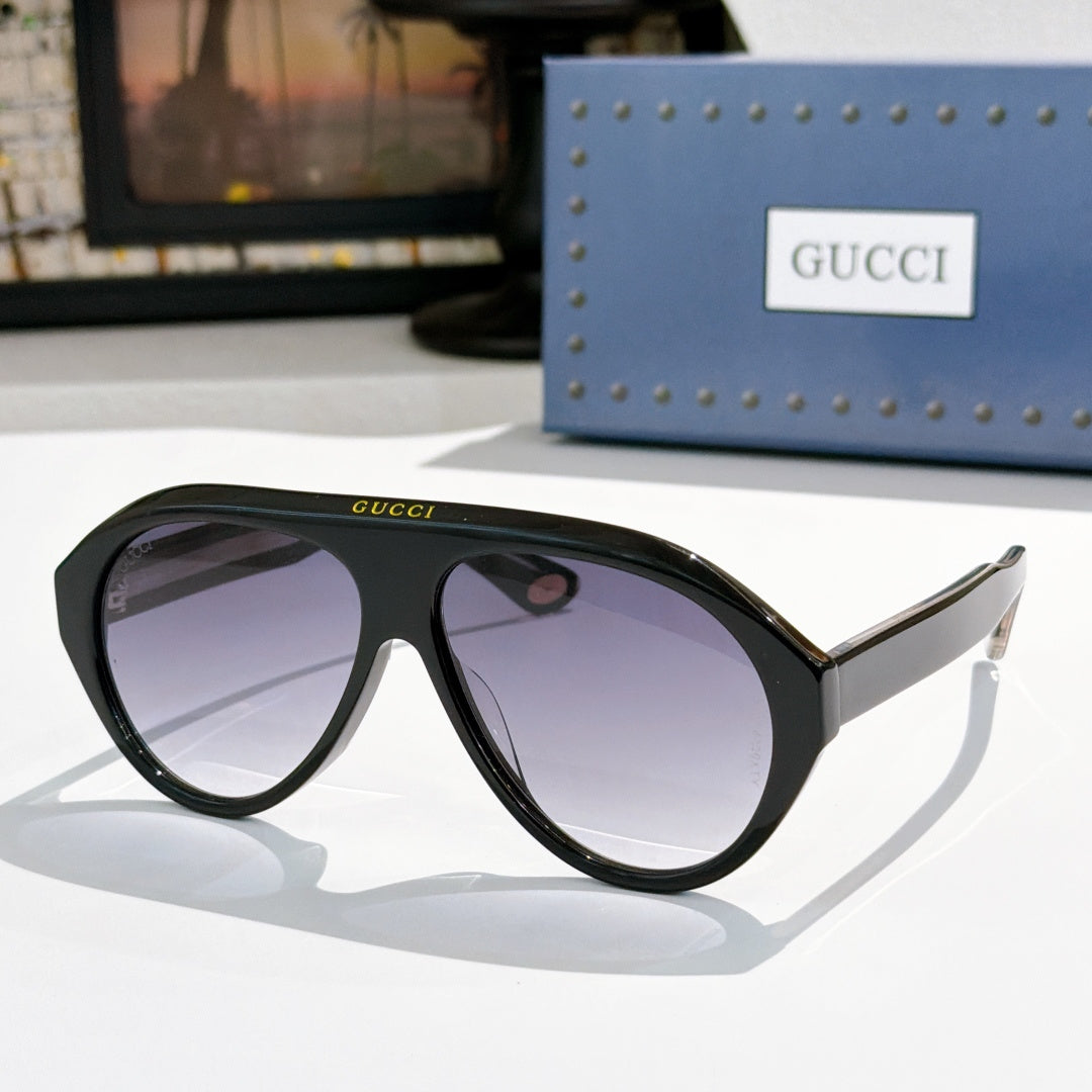 Versace sunglasses, black frames with purple tinted lenses