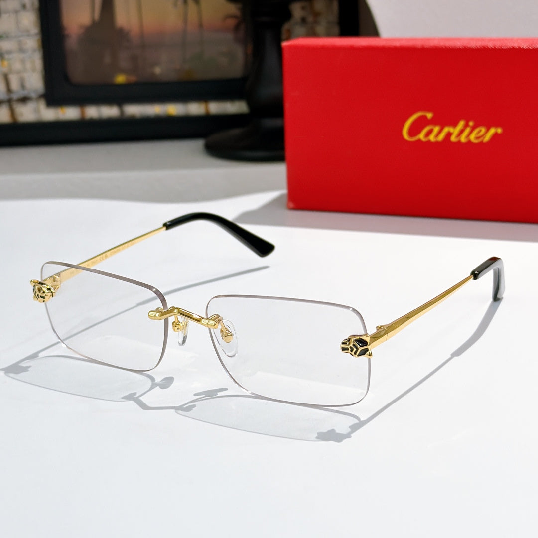 Gold-tone Cartier glasses with clear lenses and black temple tips, thin metal frame