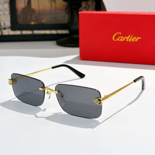 Gold-tone Cartier glasses with dark gray lens panels and black temple tips