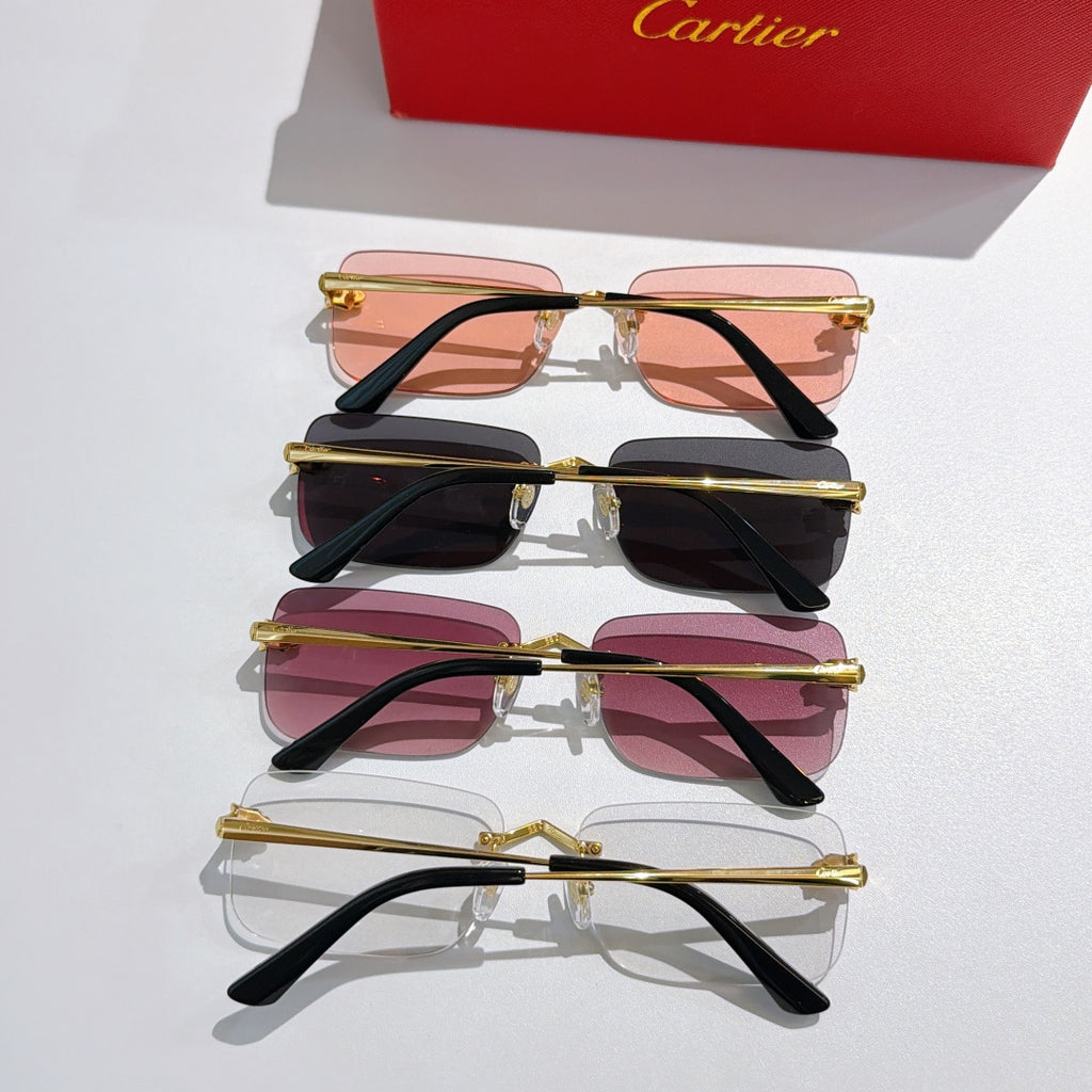 Stacked set of four Cartier glasses with tinted lenses and black frames