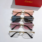 Stacked Cartier glasses with pink, teal, and black tinted lenses