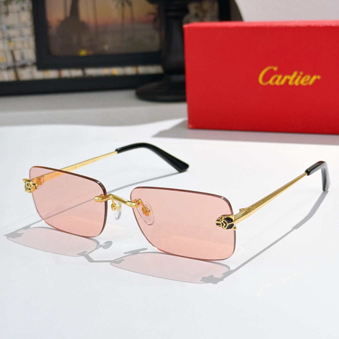 Gold-tone Cartier glasses with pink mirrored lenses and black temple tips