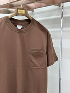 Brown crew-neck short-sleeve T-shirt with stitched chest pocket detail