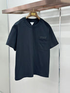 Dark navy crewneck pocket T-shirt on hanger