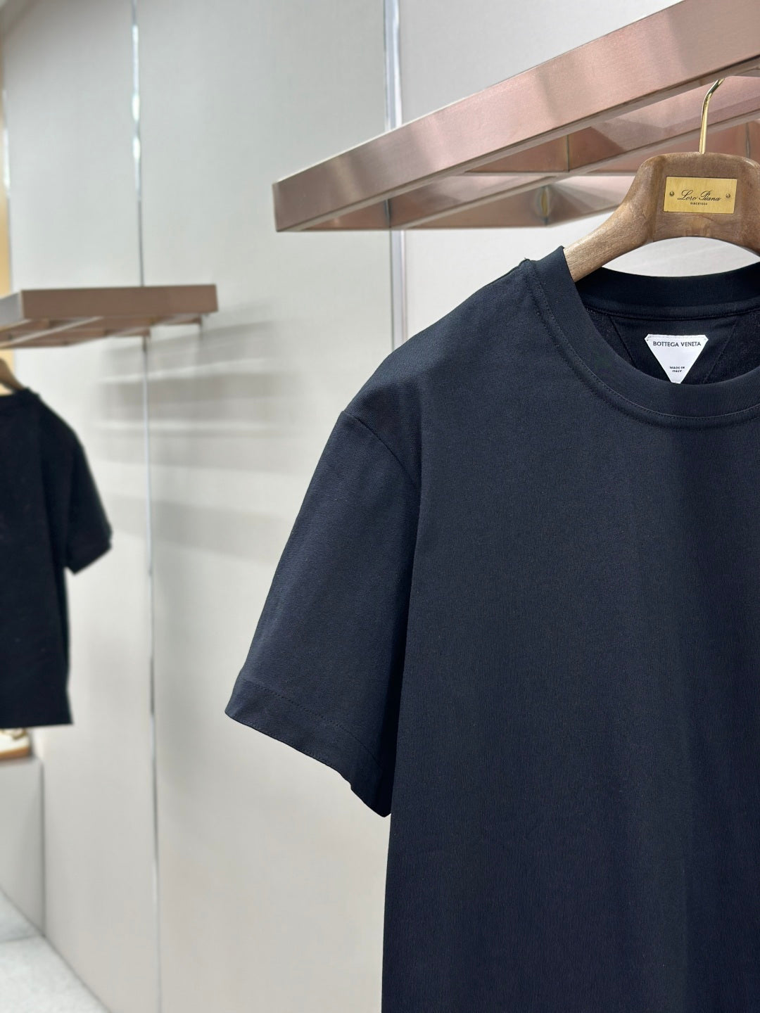 Dark navy crewneck T-shirt, short sleeve close-up
