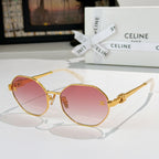 Celine sunglasses with gold frame and pink gradient lenses, rounded shape