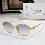 Gold-tone round sunglasses with blue-tinted lenses and gold emblem on temple